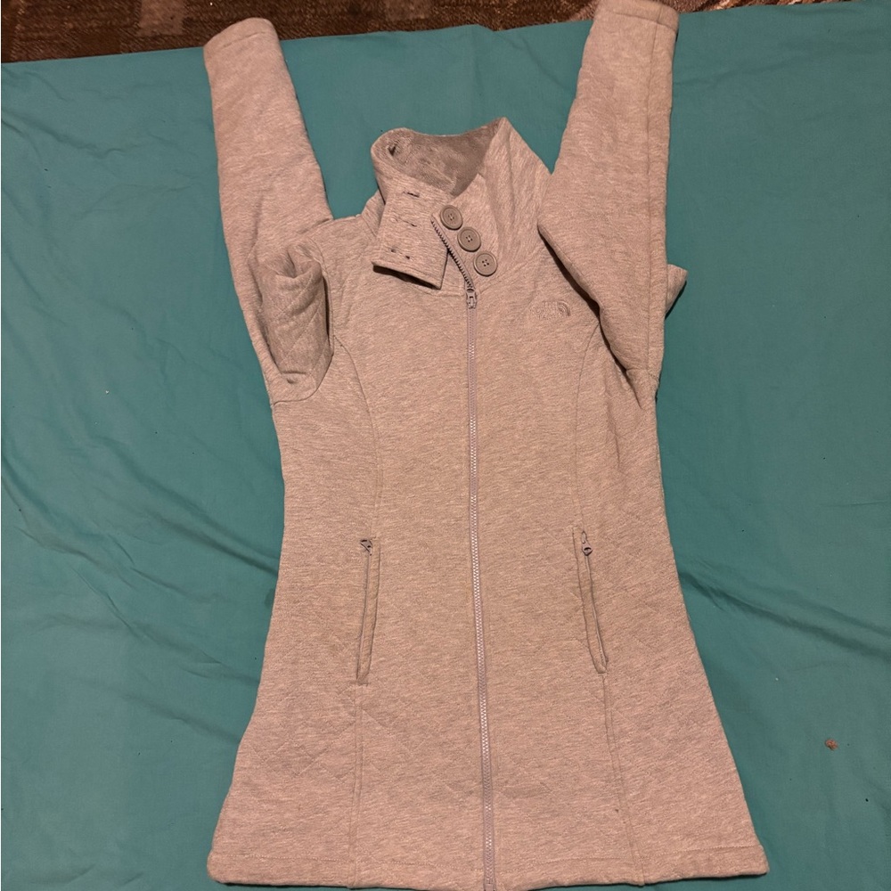 The North face rare button top quilted special material coach/jacket size M